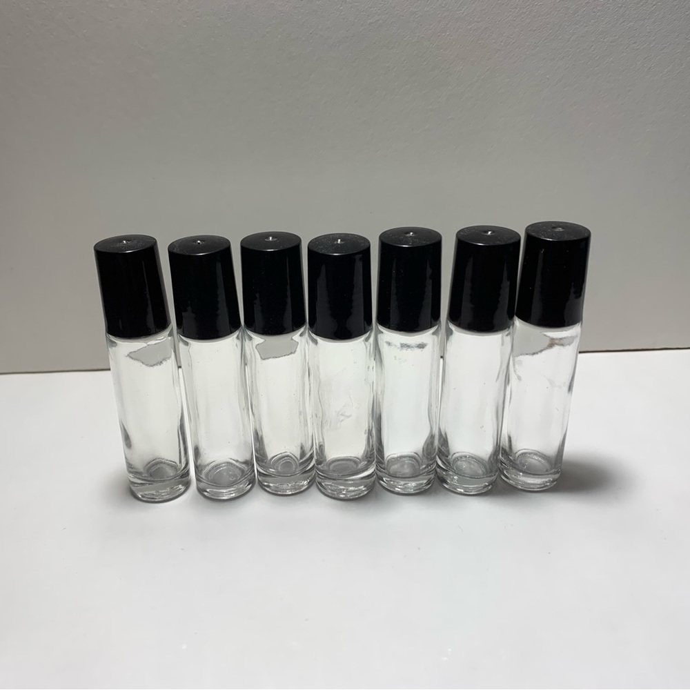 (7) Black Cap Glass Roller Bottles